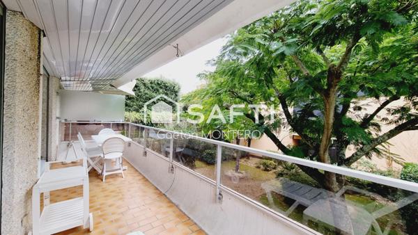 Appartement de type 2 avec balcon, cave et garage
