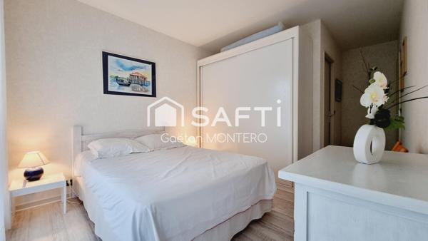 Appartement de type 2 avec balcon, cave et garage