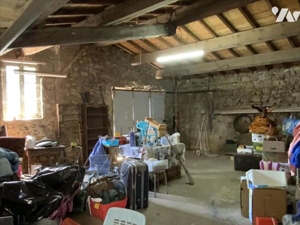 maison à rénover avec garage et terrain