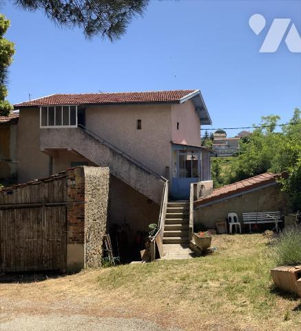 maison à rénover avec garage et terrain