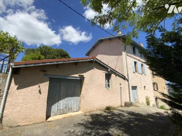 maison à rénover avec garage et terrain