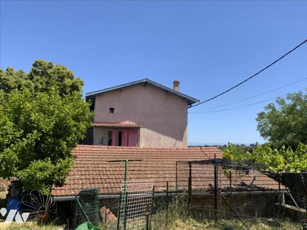maison à rénover avec garage et terrain