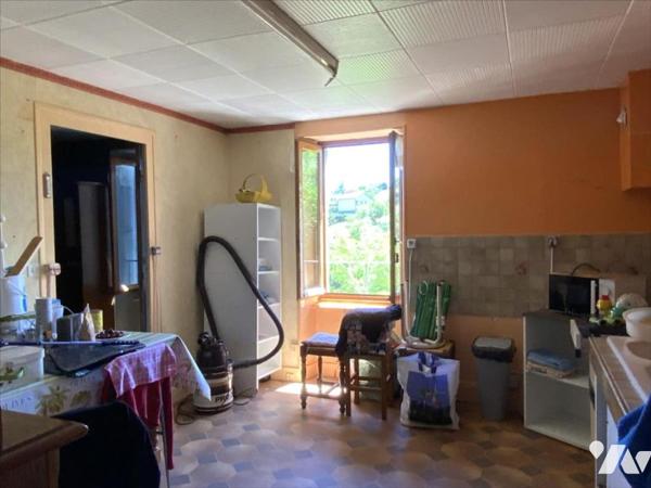maison à rénover avec garage et terrain