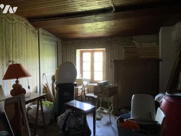 maison à rénover avec garage et terrain
