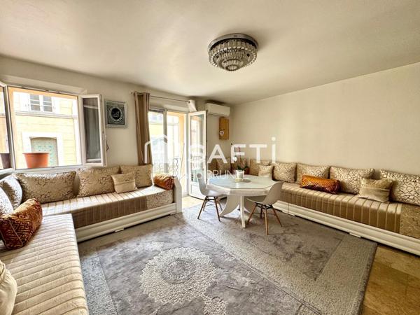 Immeuble comprenant local commercial et appart T4