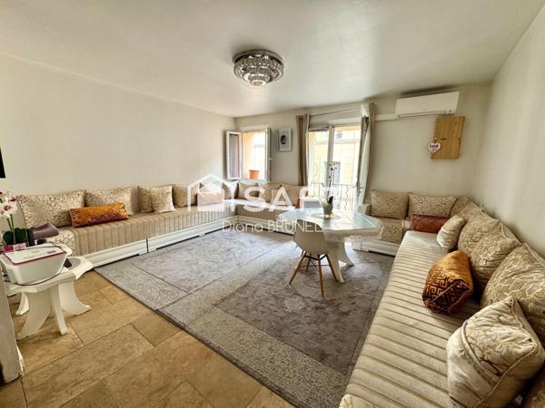 Immeuble comprenant local commercial et appart T4