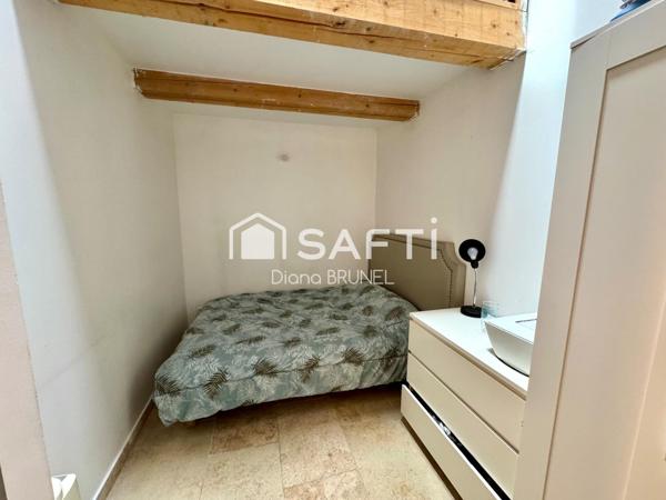 Immeuble comprenant local commercial et appart T4