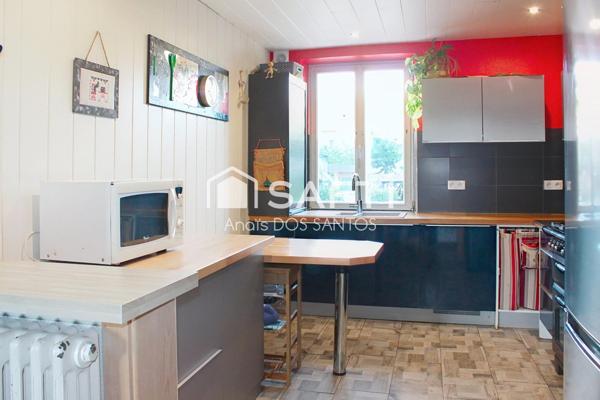 Appartement 5 pièces avec jardin privatif, cave et garage