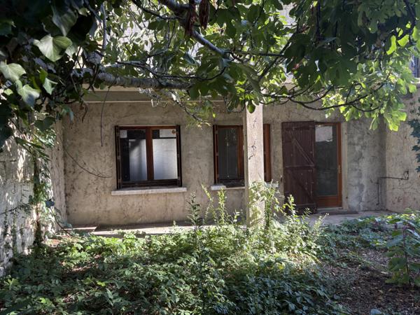 Maison avec 3 chambres, un bureau, un jardin et un garage