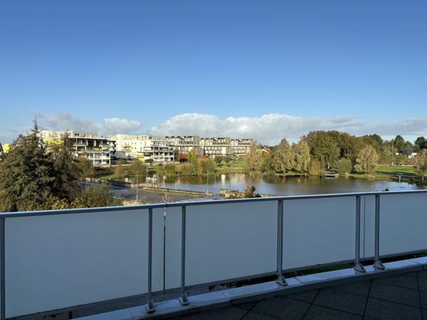 appartement 64m² + balcon 50m² + 2 places parking