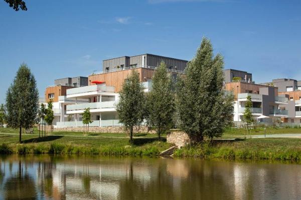 appartement 64m² + balcon 50m² + 2 places parking