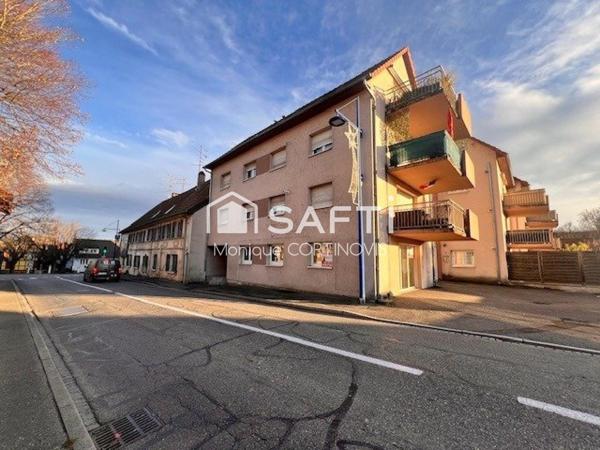Local commercial de 64m² environ, trois pièces, cave, parking couvert situé à Sierentz