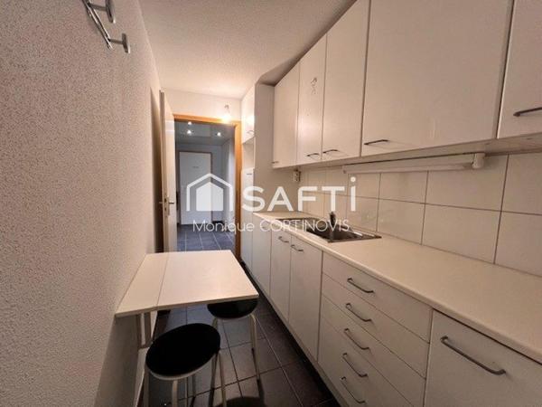 Local commercial de 64m² environ, trois pièces, cave, parking couvert situé à Sierentz