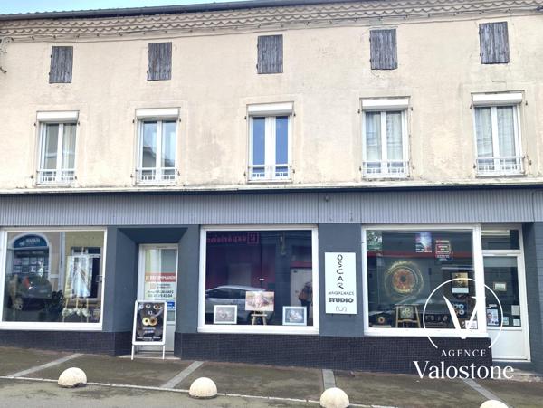 Immeuble commercial + 2 appartements