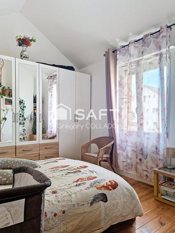 Pavillon 3 pièces non mitoyen, 2 chambres, terrasse, parking.