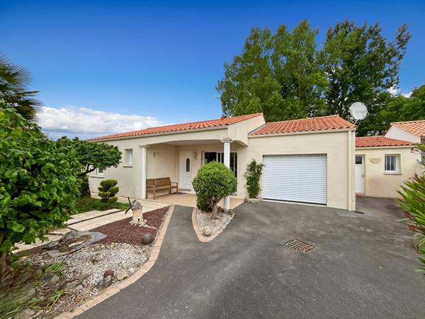 Maison de plain-pied aux normes PMR proche commerces à Challans
