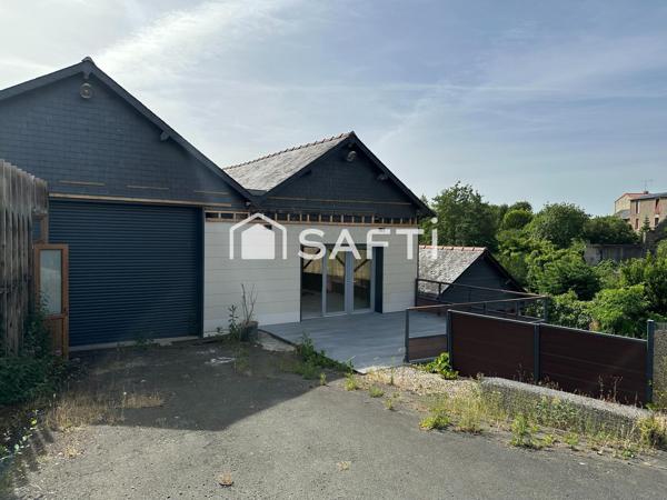 Opportunité d'investissement – Local commercial/artisanal de 350 m² sur grand terrain, fort potentiel de réhabilitation