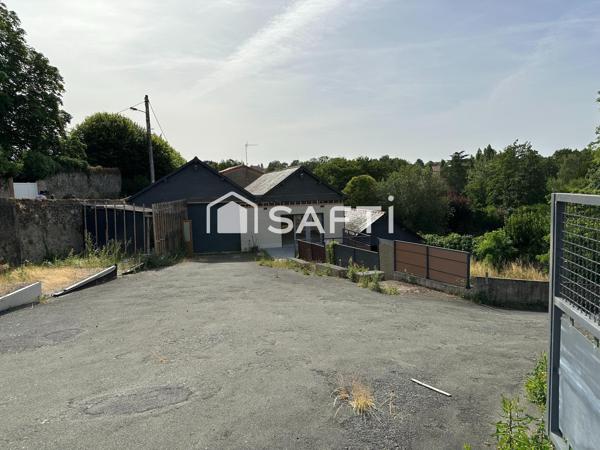 Opportunité d'investissement – Local commercial/artisanal de 350 m² sur grand terrain, fort potentiel de réhabilitation