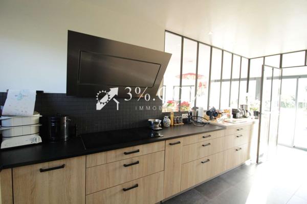 Maison 7 pièce(s) 4 chambre(s) 225 m²