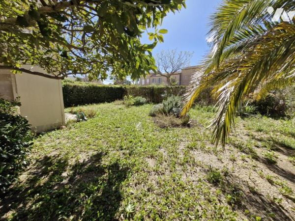 Appartement T4 en rez-de-jardin + place de parking privative