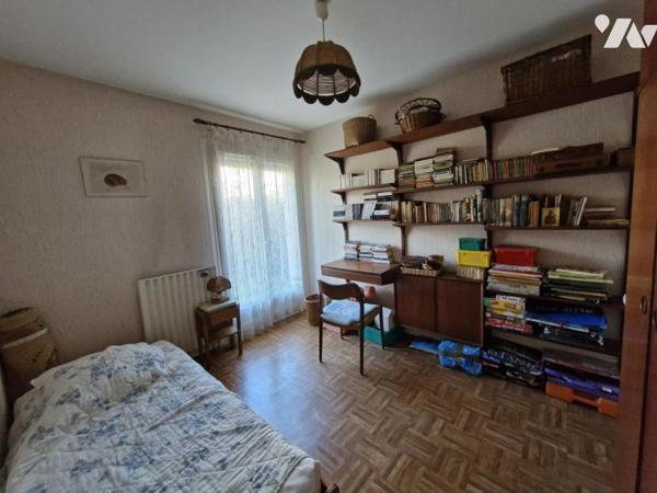 Appartement T4 en rez-de-jardin + place de parking privative