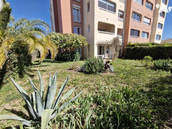Appartement T4 en rez-de-jardin + place de parking privative