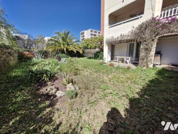 Appartement T4 en rez-de-jardin + place de parking privative