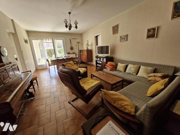 Appartement T4 en rez-de-jardin + place de parking privative