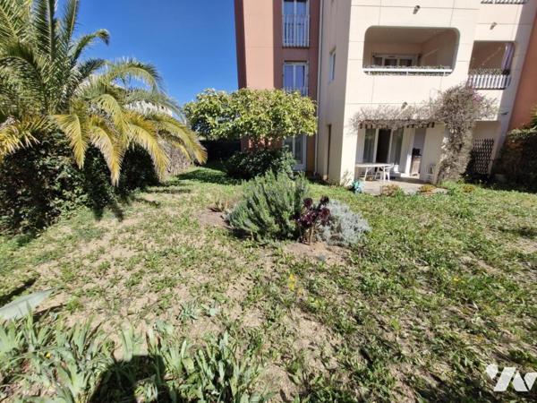 Appartement T4 en rez-de-jardin + place de parking privative