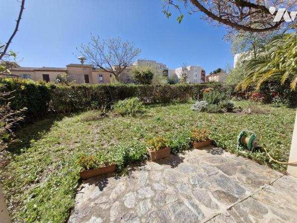 Appartement T4 en rez-de-jardin + place de parking privative