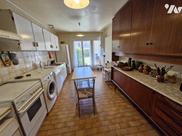 Appartement T4 en rez-de-jardin + place de parking privative