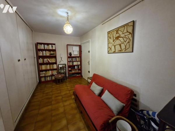 Appartement T4 en rez-de-jardin + place de parking privative