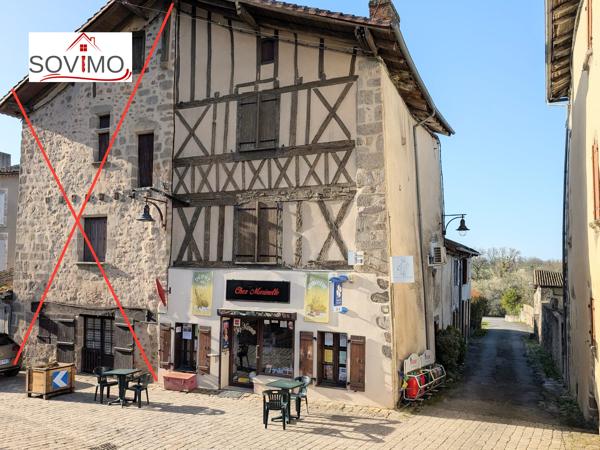 DANS UN JOLIE BOURG, IMMEUBLE LOUÉ AVEC LOCAL COMMERCIAL EN ACTIVITÉ