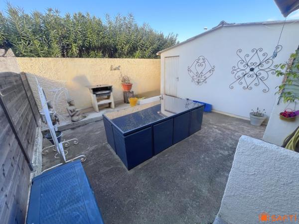 Deux chambres , terrasses, garage et stationnements