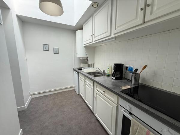 Maison d'habitation divisé en 3 appartements