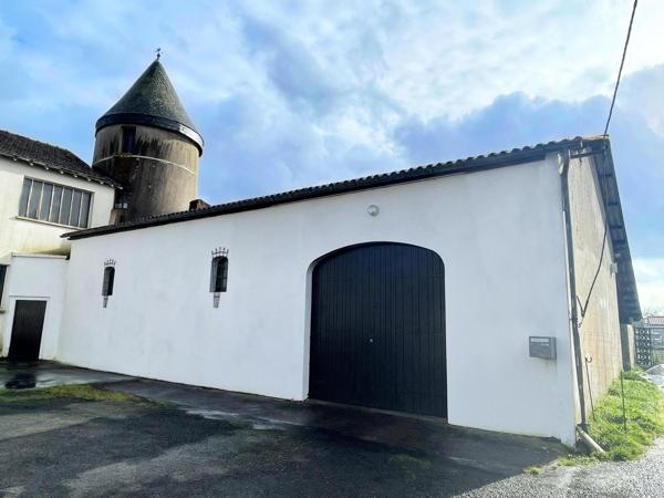 Hangar de 250 m² avec ancien moulin – Fort potentiel