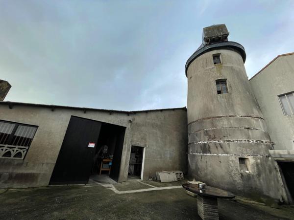 Hangar de 250 m² avec ancien moulin – Fort potentiel