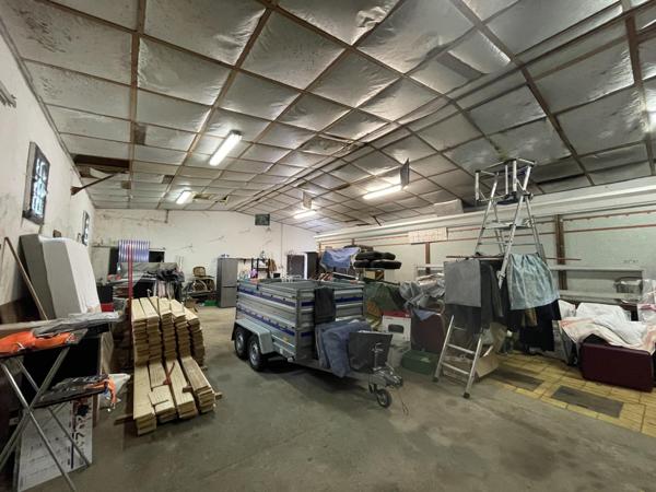 Hangar de 250 m² avec ancien moulin – Fort potentiel