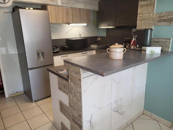 Appartement 3 pièces avec garage et parking privatif