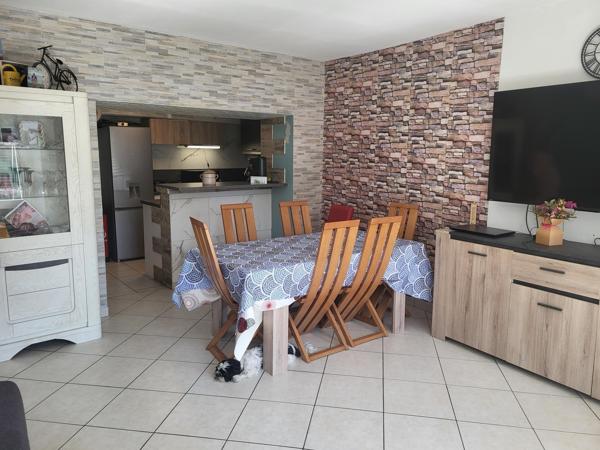 Appartement 3 pièces avec garage et parking privatif