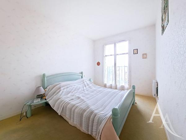 Au centre ville de Mantes La Jolie grand 3 pièces de 75 m² avec extérieur