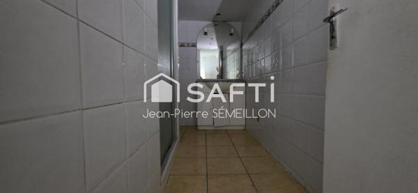 Immeuble mixte 203 m² avec cour 92 m² et parking