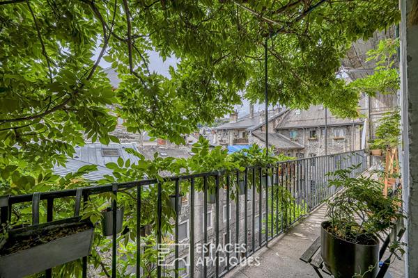 Appartement bourgeois à l’esprit vintage et son éden suspendu