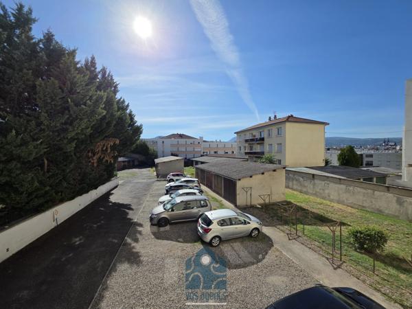 Appartement 4 pièces avec balcon, garage, stationnement et cave