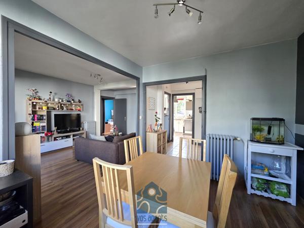 Appartement 4 pièces avec balcon, garage, stationnement et cave