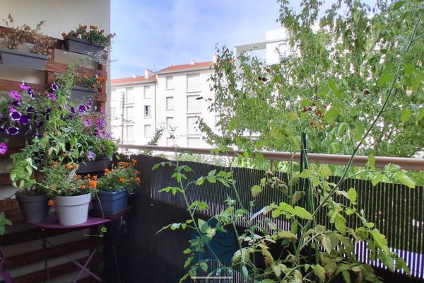 Appartement 4 pièces avec balcon, garage, stationnement et cave