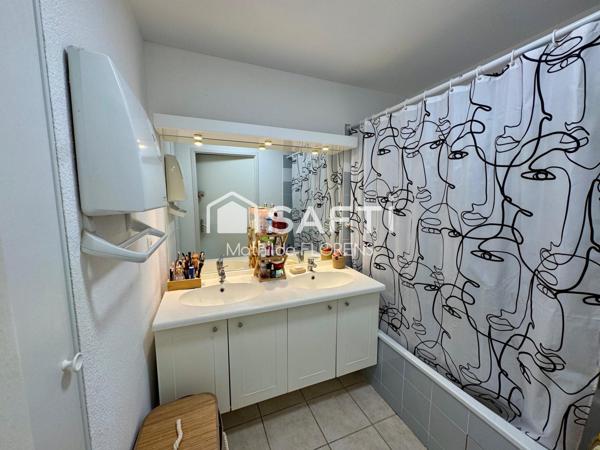 Appartement T3 d'environ 65 m² avec deux balcons, garage fermé, piscine et salle de sport !