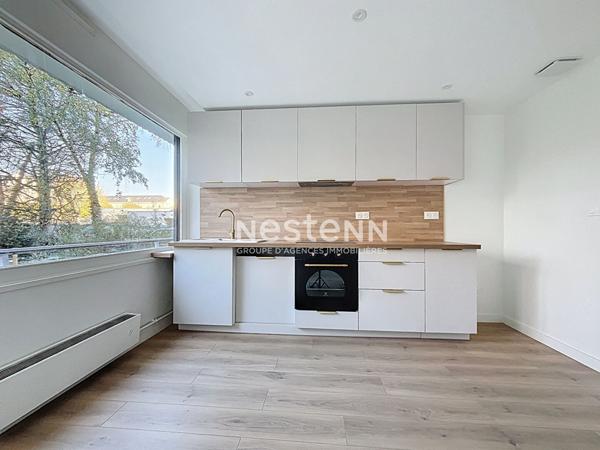 A vendre - Appartement T4 lumineux et rénové avec balcon, stationnement et cave, dans résidence sécurisée avec ascenseur proche des commodités "Angers La Madeleine"