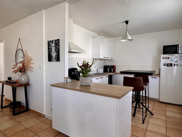 Maison de plain-pied T3 avec garage et jardin