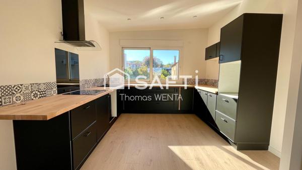 Appartement lumineux et moderne avec terrasse et garage